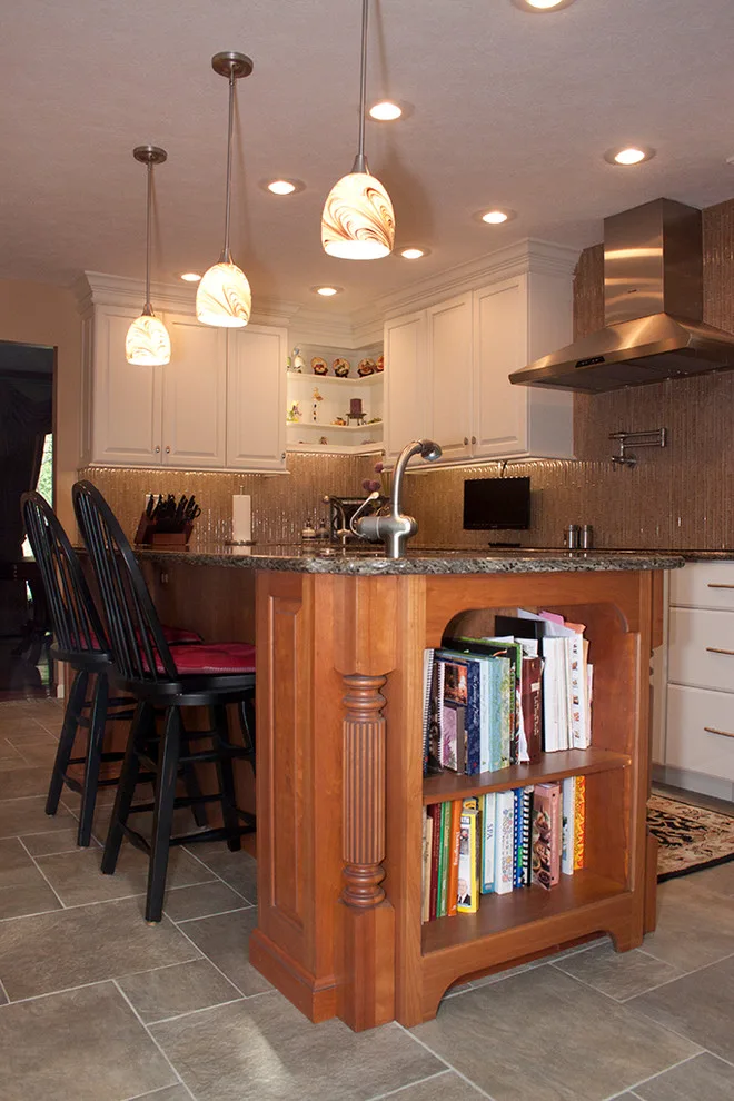 Contrasting Island in a White Kitchen by Kitchens & Interiors, Inc. - Photo 7