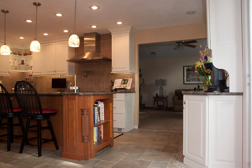 Contrasting Island in a White Kitchen by Kitchens & Interiors, Inc. - Photo 9