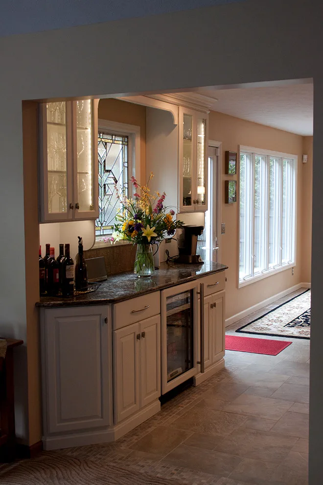 Contrasting Island in a White Kitchen by Kitchens & Interiors, Inc. - Photo 11