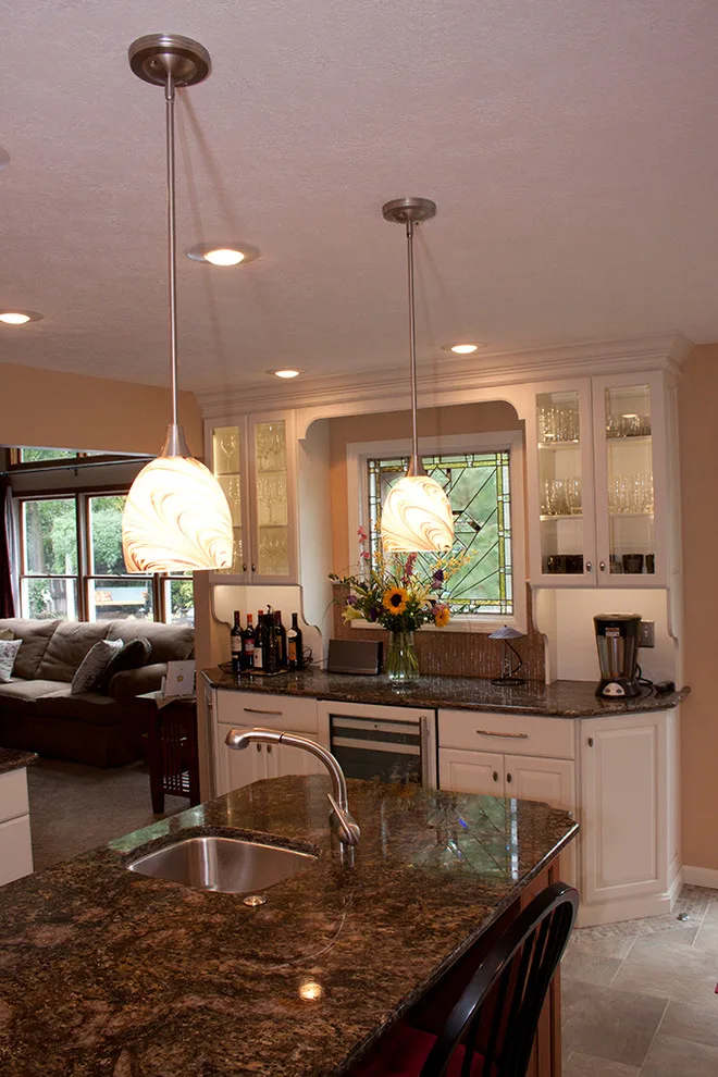 Contrasting Island in a White Kitchen by Kitchens & Interiors, Inc. - Photo 8