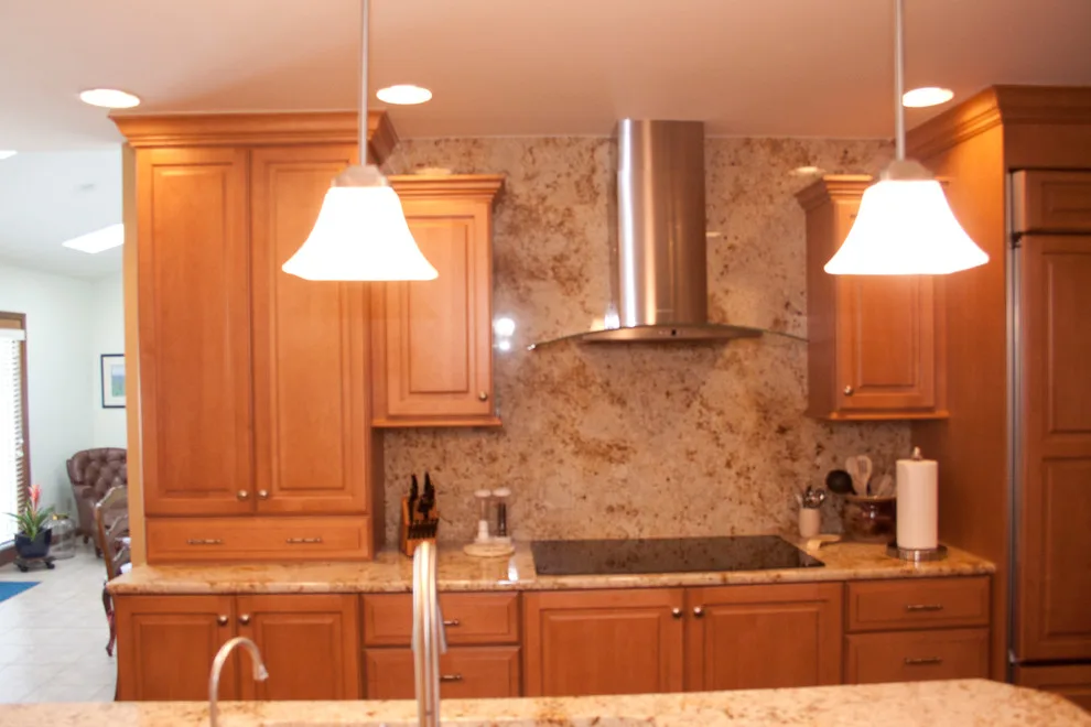 Ceiling-Height Granite Backsplash Kitchen by Kitchens & Interiors, Inc. - Photo 7