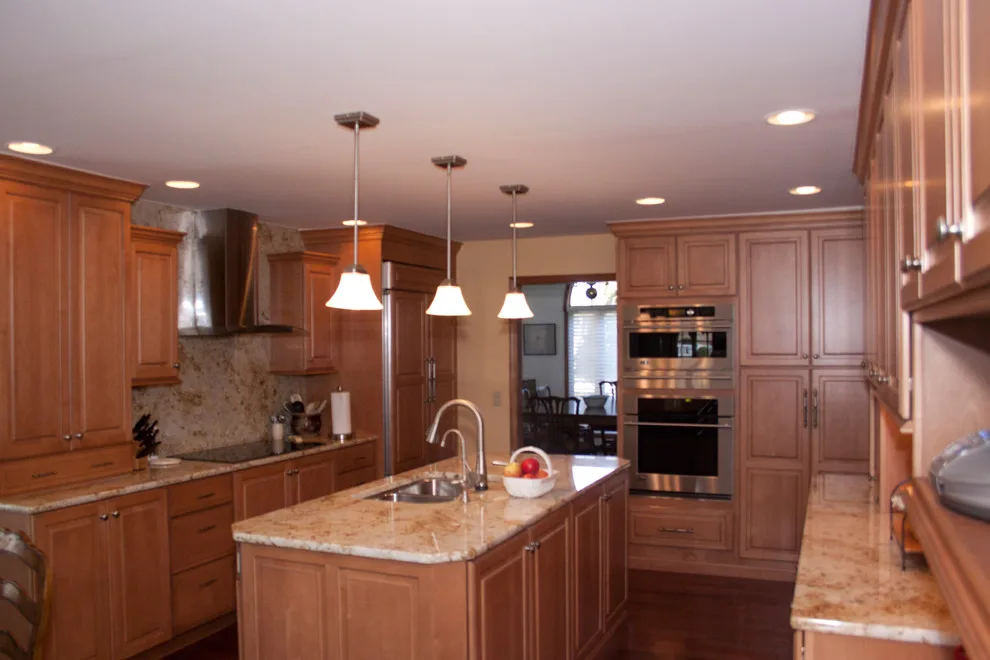 Ceiling-Height Granite Backsplash Kitchen by Kitchens & Interiors, Inc. - Photo 3