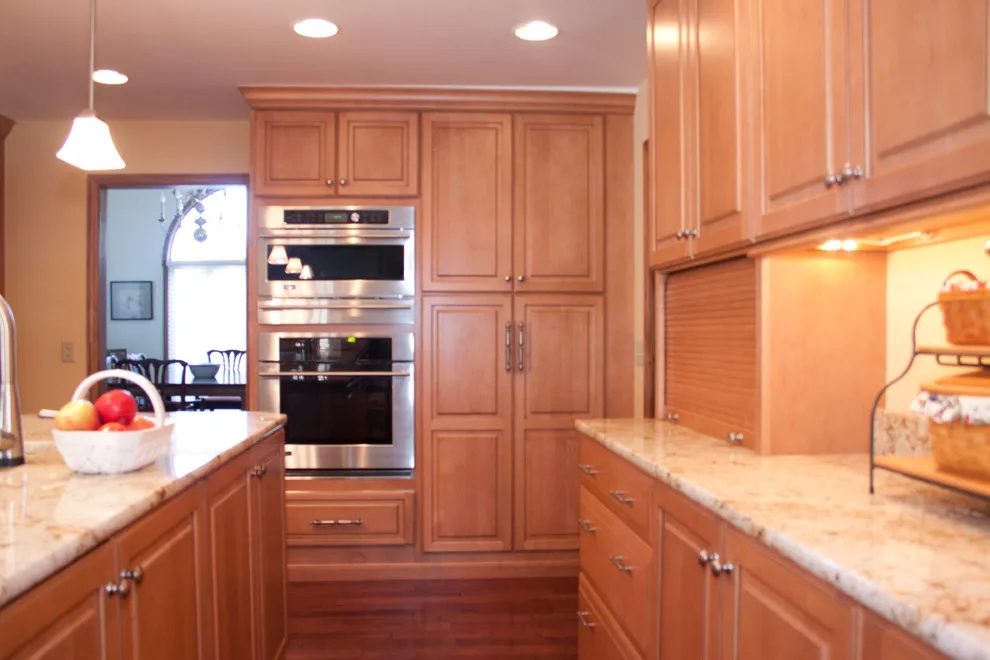 Ceiling-Height Granite Backsplash Kitchen by Kitchens & Interiors, Inc. - Photo 8