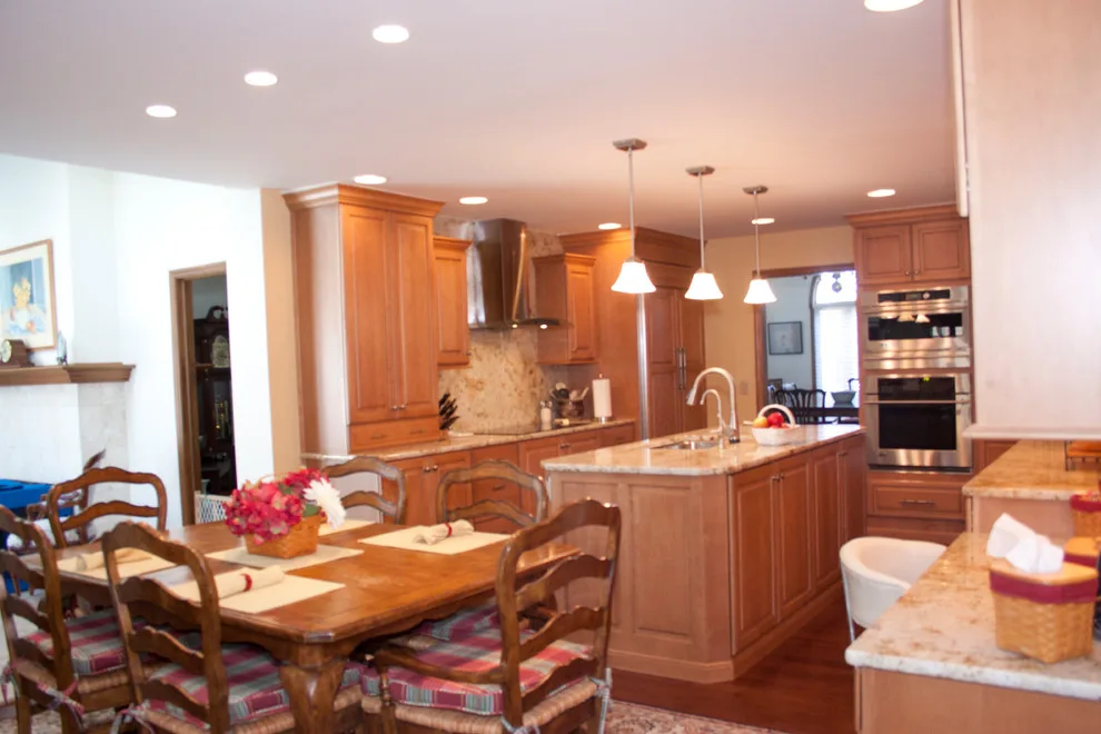 Ceiling-Height Granite Backsplash Kitchen by Kitchens & Interiors, Inc. - Photo 6