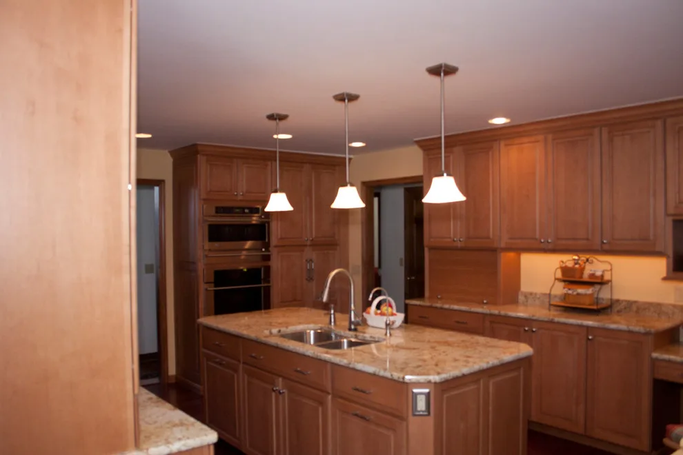 Ceiling-Height Granite Backsplash Kitchen by Kitchens & Interiors, Inc. - Photo 4