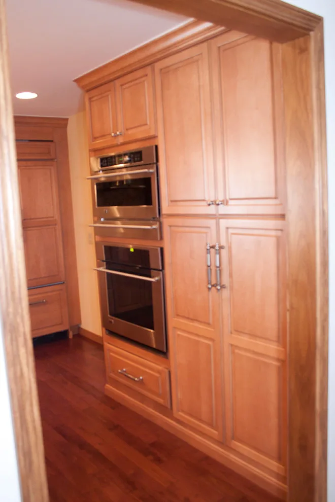 Ceiling-Height Granite Backsplash Kitchen by Kitchens & Interiors, Inc. - Photo 5