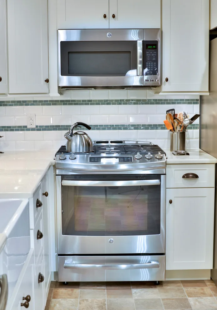 Charming Kitchen with Island by Excel Remodeling - Photo 13