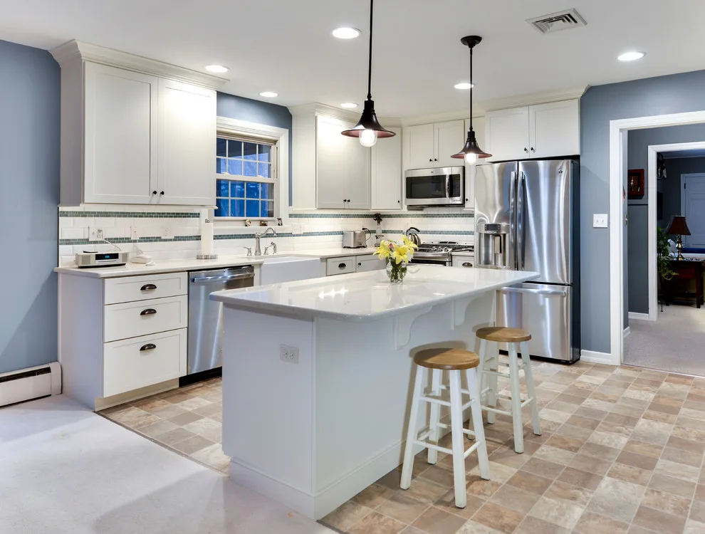 Charming Kitchen with Island by Excel Remodeling - Photo 12