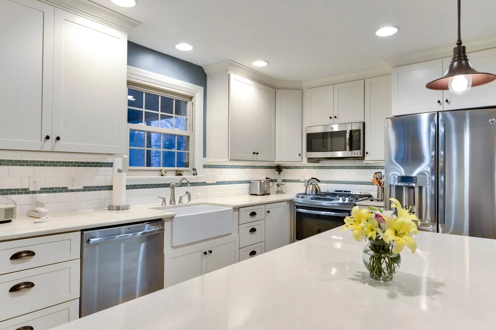 Charming Kitchen with Island by Excel Remodeling - Photo 11