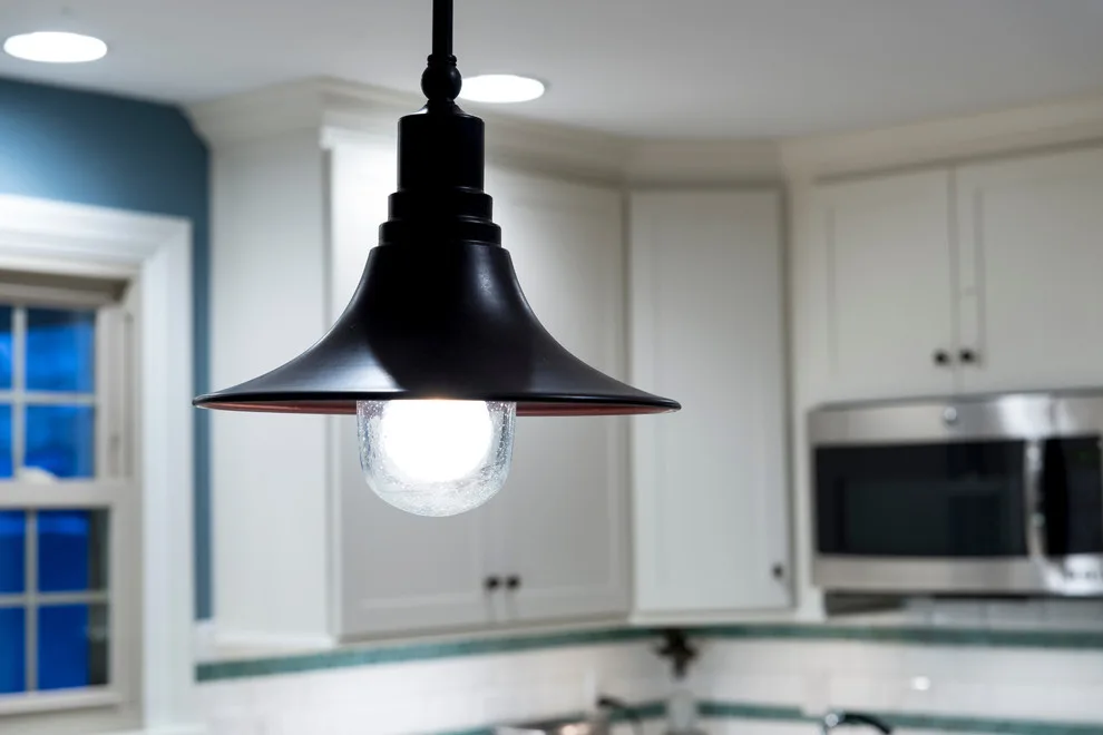 Charming Kitchen with Island by Excel Remodeling - Photo 10