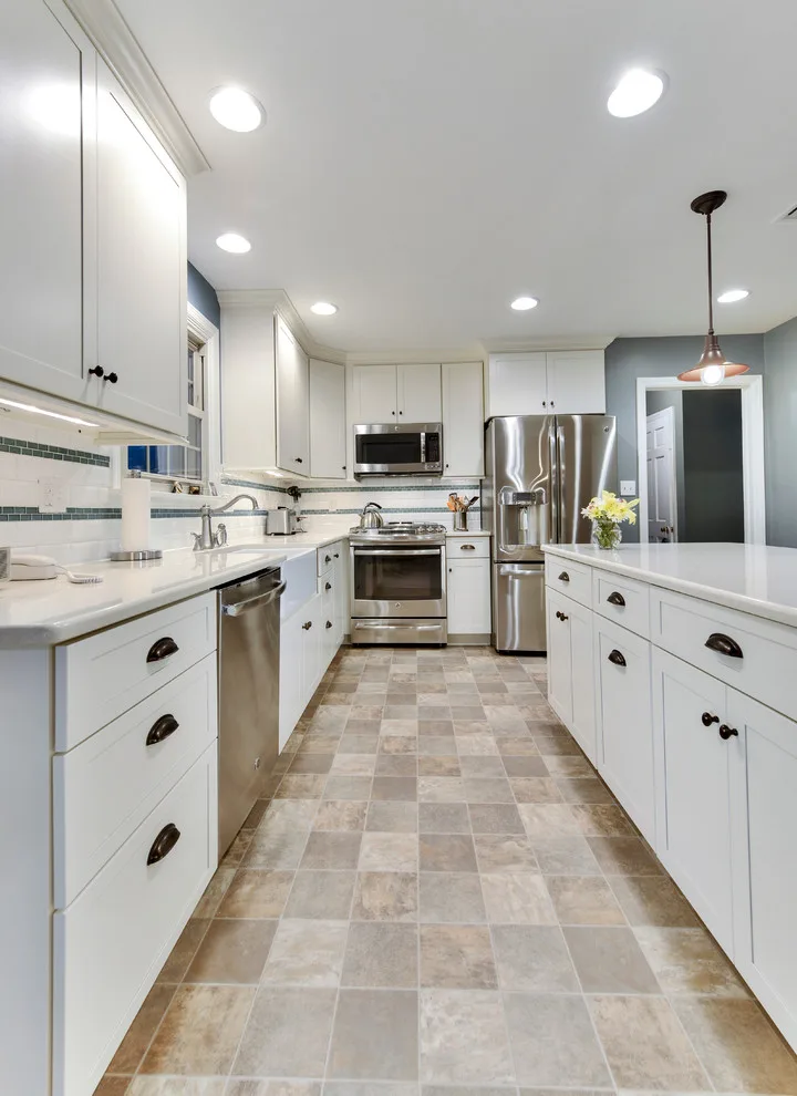 Charming Kitchen with Island by Excel Remodeling - Photo 14