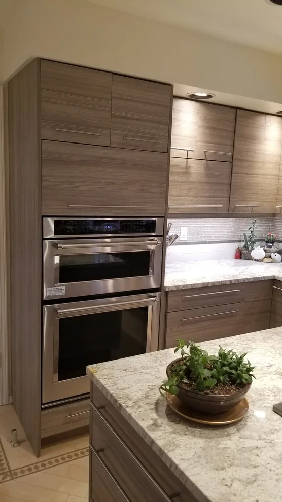 Contemporary Linear Laminate Kitchen in Alaska by Jamie Tamanaha With Florcraft Carpet One - Photo 12