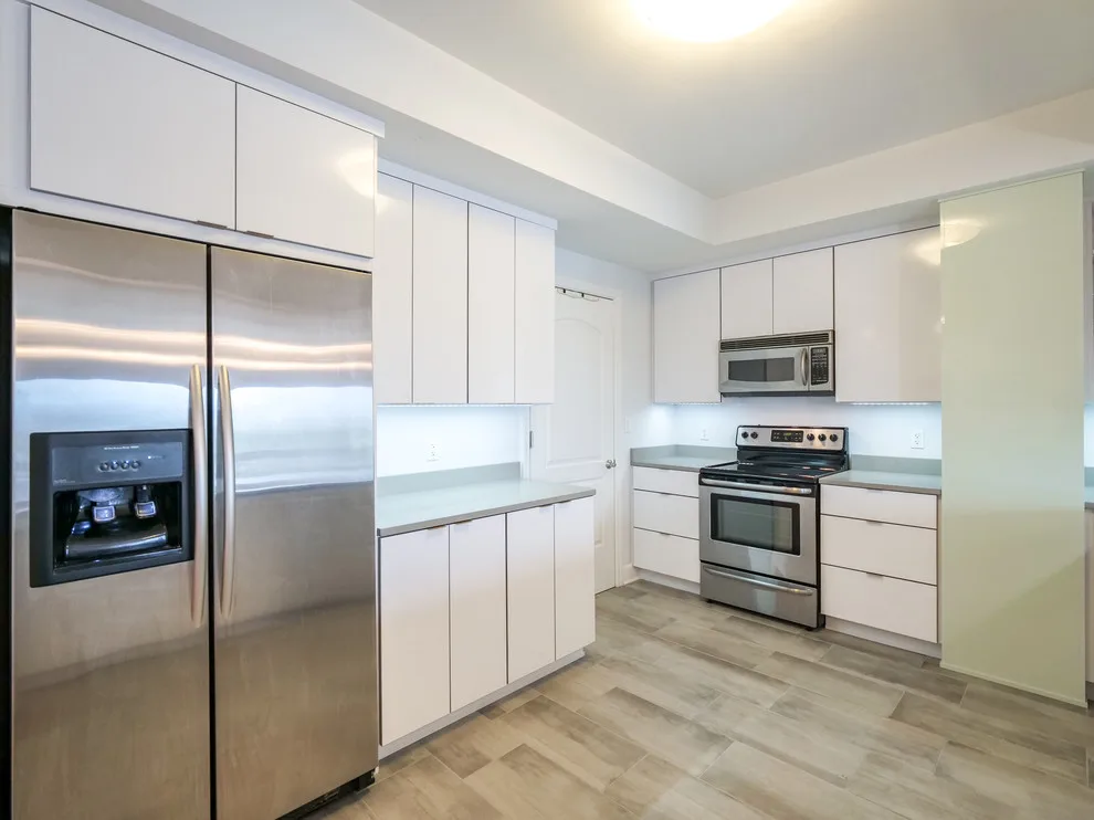 Mid-Century Modern Beach Condo by Woodsman Kitchens And Floors - Photo 6