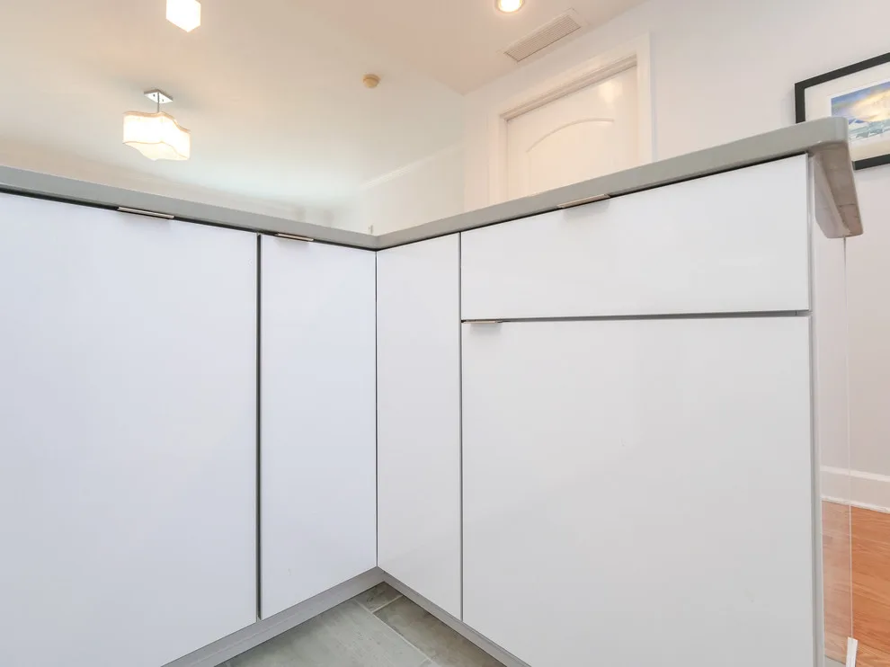 Mid-Century Modern Beach Condo by Woodsman Kitchens And Floors - Photo 4