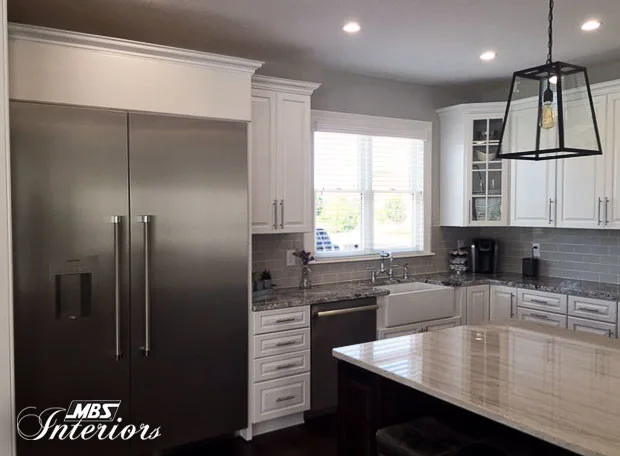 Timeless Dual-Hued Kitchen by MBS Interiors - Photo 14