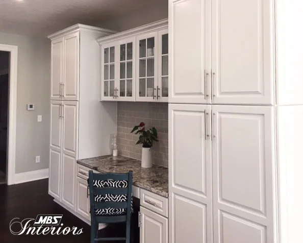 Timeless Dual-Hued Kitchen by MBS Interiors - Photo 16