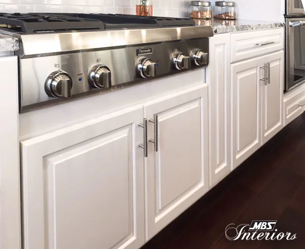 Timeless Dual-Hued Kitchen by MBS Interiors - Photo 18
