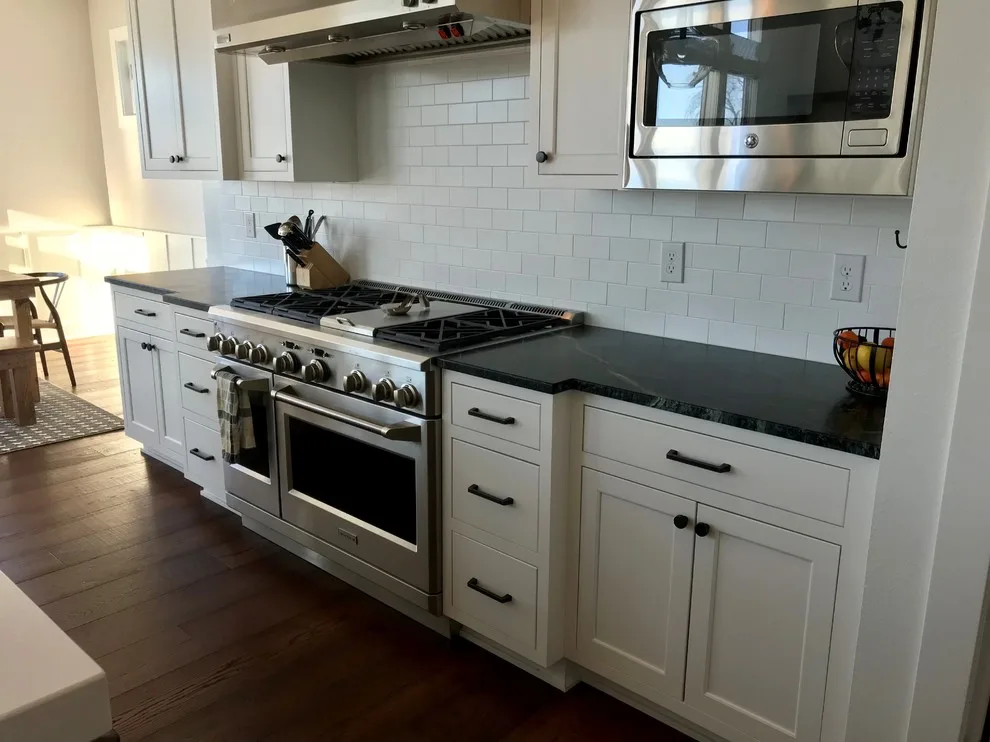 Timeless White Kitchen by Woodharbor Design Showroom - Photo 4