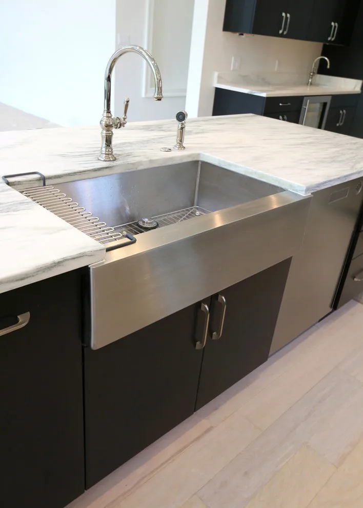 Modern Kitchen Design Featuring a Marble Waterfall Countertop by Classic Cupboards, Inc - Photo 6