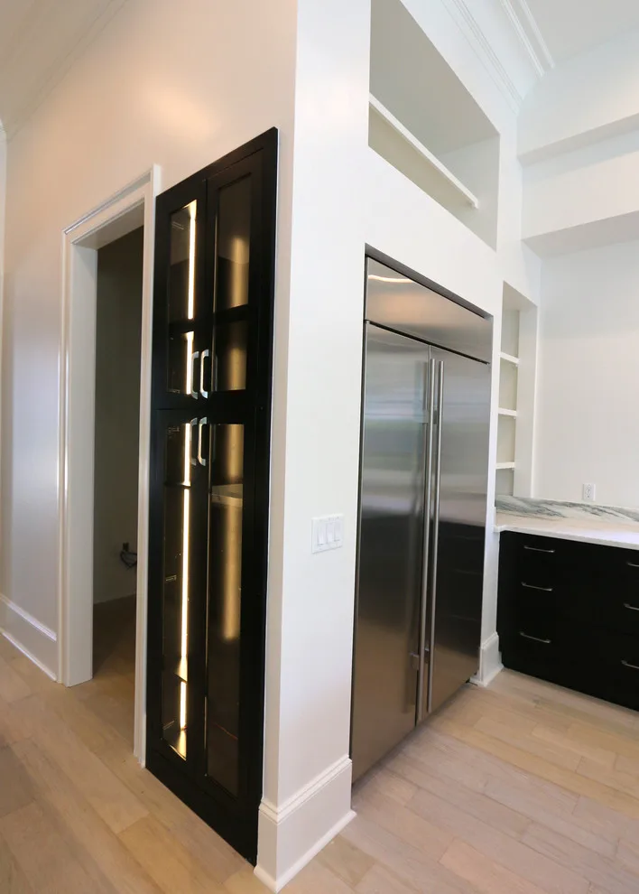 Modern Kitchen Design Featuring a Marble Waterfall Countertop by Classic Cupboards, Inc - Photo 4