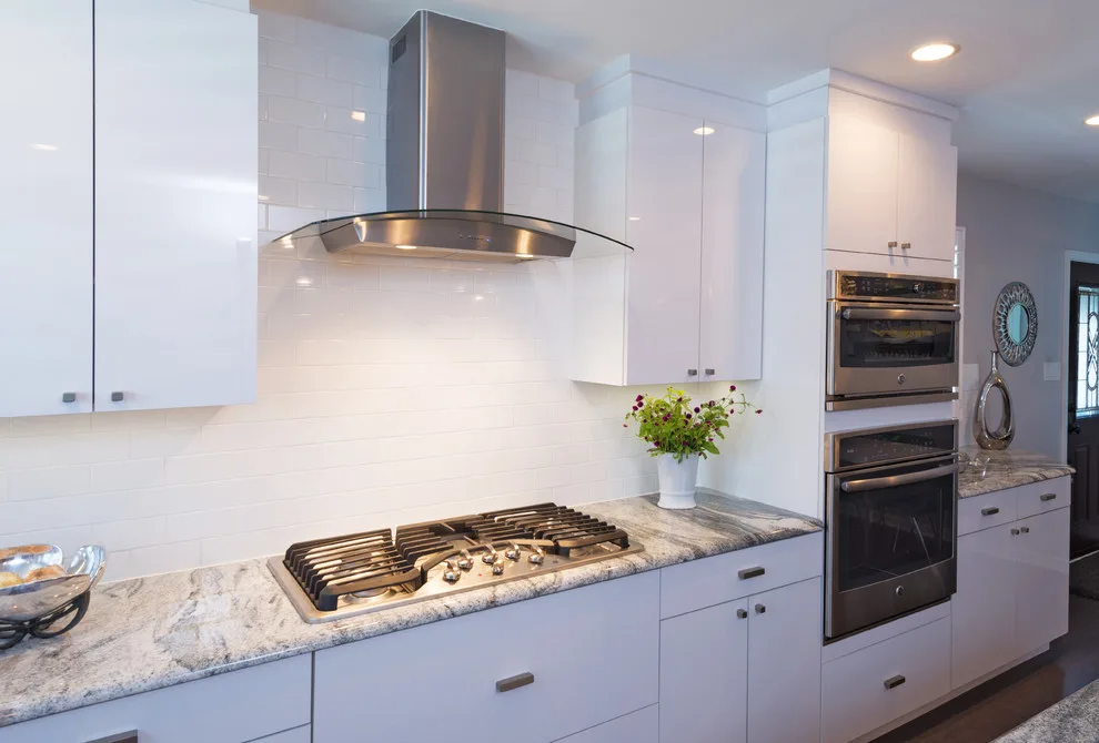 Modern Kitchen with White Laminate Cabinetry by Main Line Kitchen Design - Photo 11