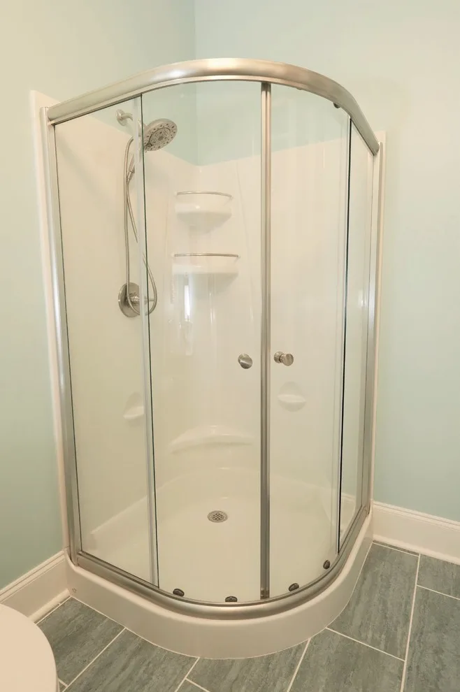 Coy Pond Visitor Bathroom by Margaret Volney Designs, LLC - Photo 9