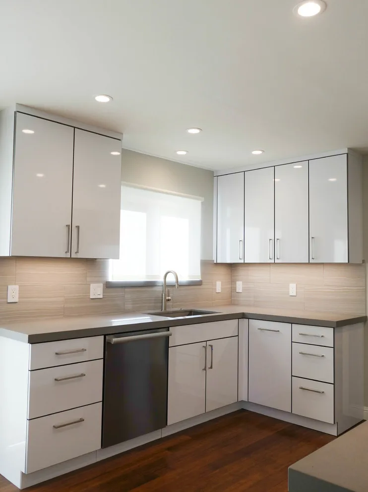 Crestview Sleek White Contemporary Kitchen by Kitchen Inspiration Inc. - Photo 6