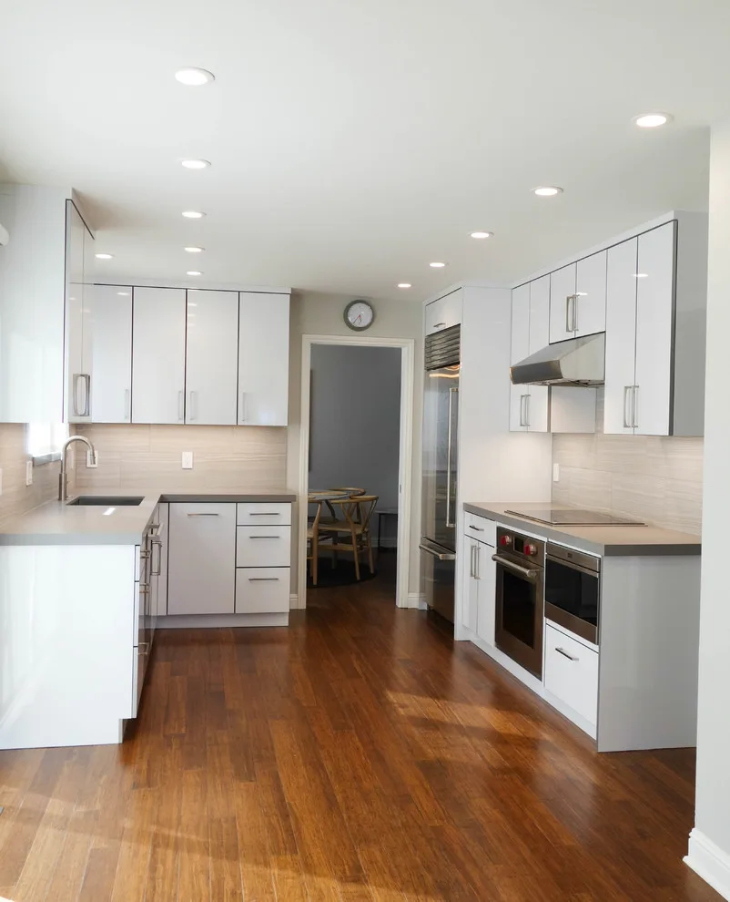 Crestview Sleek White Contemporary Kitchen by Kitchen Inspiration Inc. - Photo 4