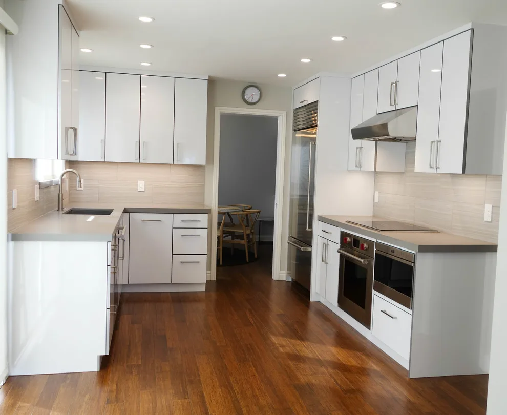 Crestview Sleek White Contemporary Kitchen by Kitchen Inspiration Inc. - Photo 2