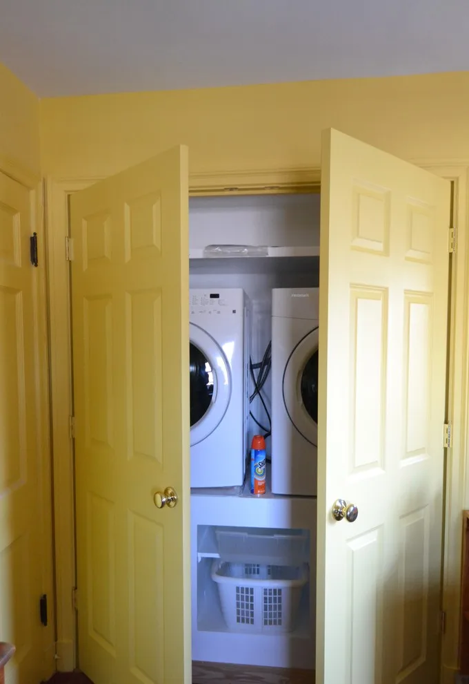 Bespoke laundry storage space by Remodeling And Painting Experts Inc. - Photo 7