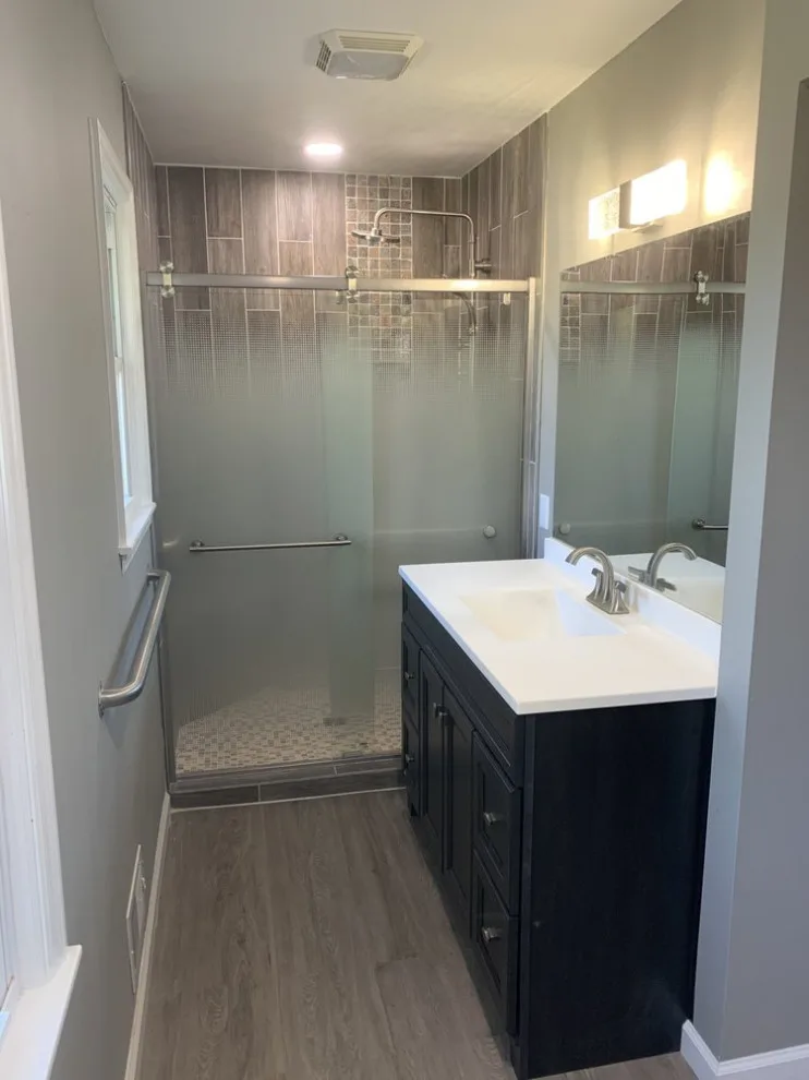 Restroom Renovations by American Homes Remodel And New Construction - Photo 5