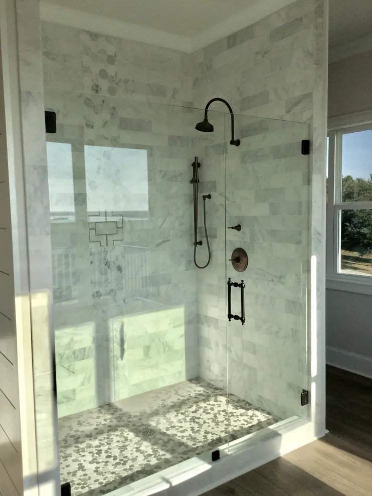 Restrooms by Dimension Design & Construction, LLC. - Photo 13