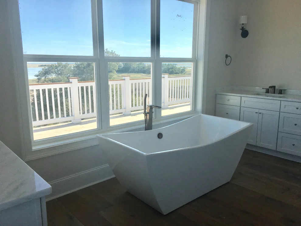 Restrooms by Dimension Design & Construction, LLC. - Photo 5