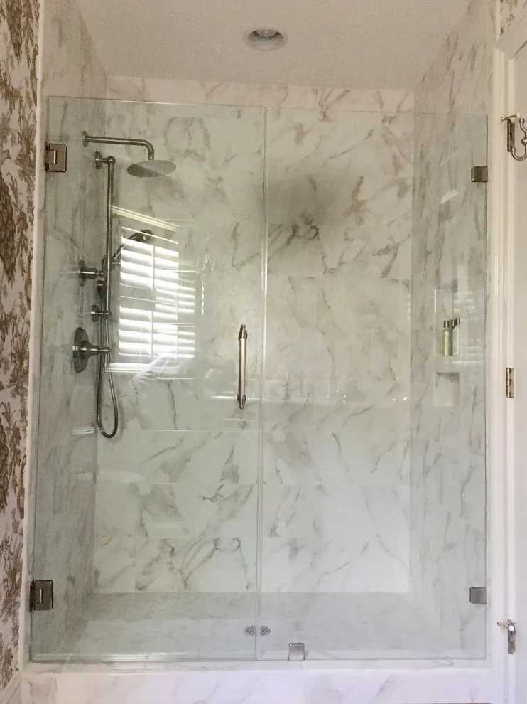 Restrooms by Dimension Design & Construction, LLC. - Photo 16