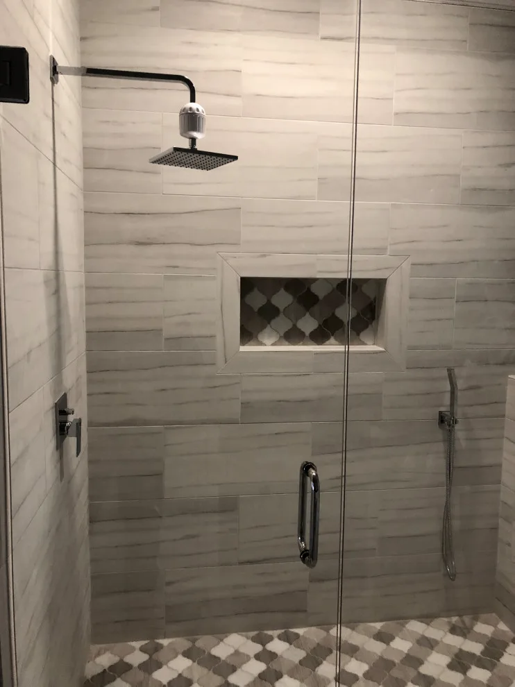 Restrooms by Dimension Design & Construction, LLC. - Photo 3
