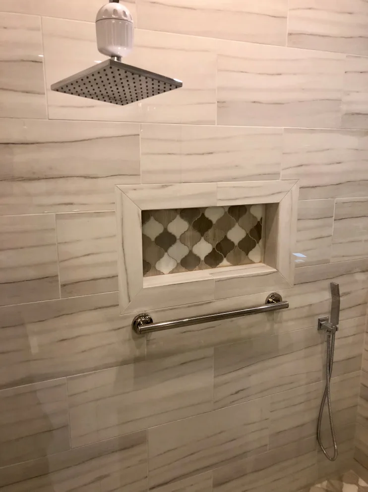 Restrooms by Dimension Design & Construction, LLC. - Photo 11