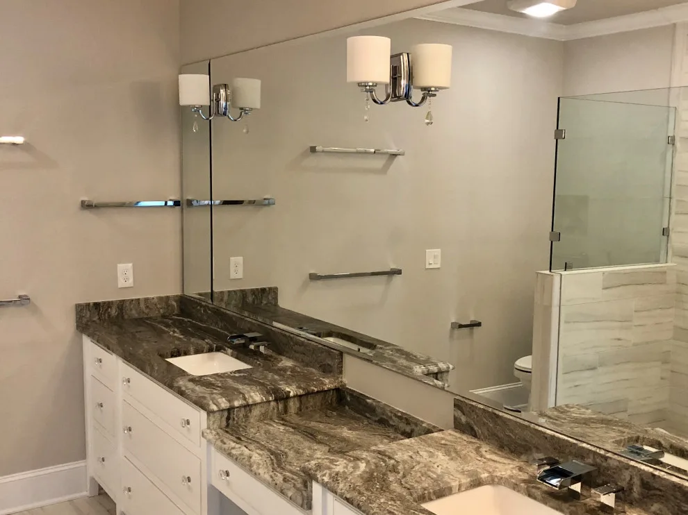 Restrooms by Dimension Design & Construction, LLC. - Photo 15