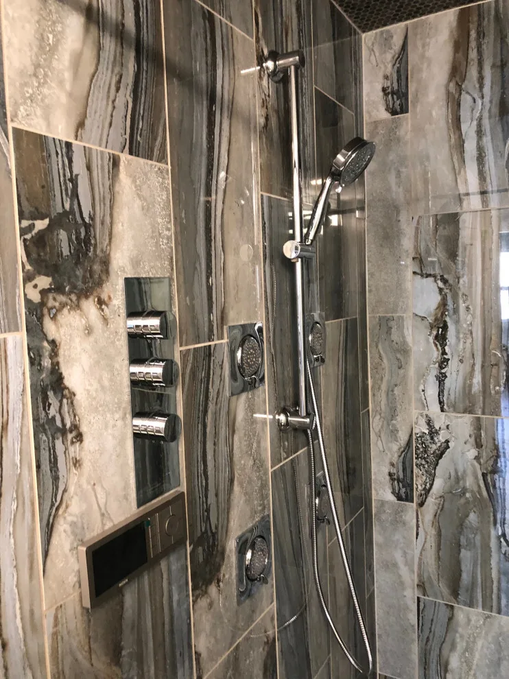 Restrooms by Dimension Design & Construction, LLC. - Photo 8