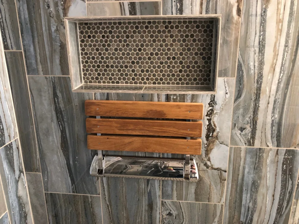 Restrooms by Dimension Design & Construction, LLC. - Photo 12