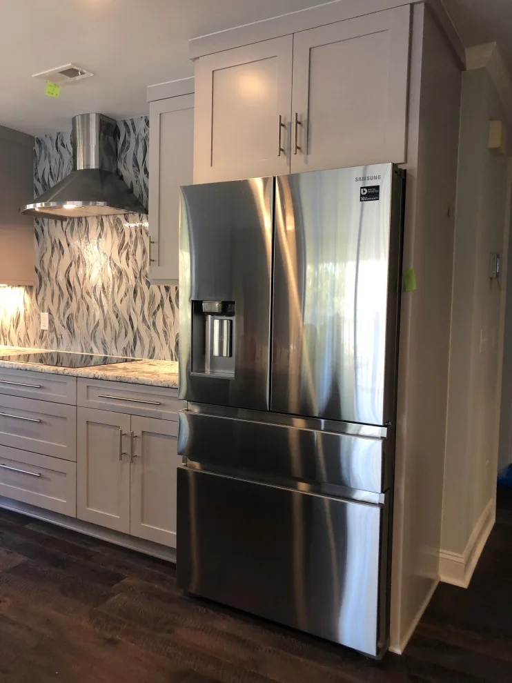 Coastal Apartment by Dimension Design & Construction, LLC. - Photo 3