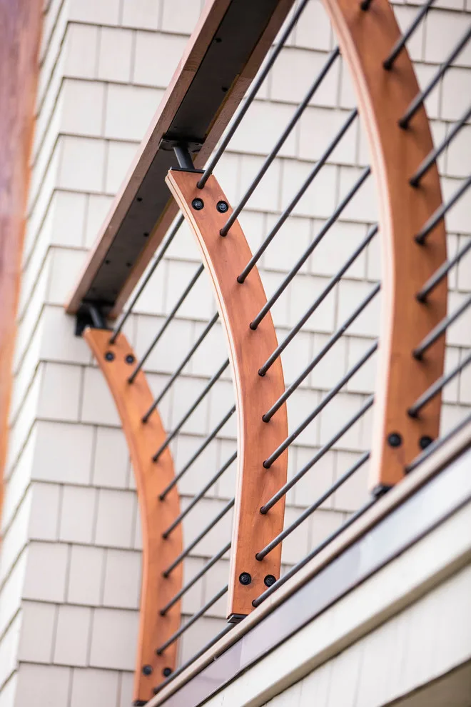 Modern deck featuring custom railings, flooring, gate, and greenhouse by Treeline Construction - Photo 39