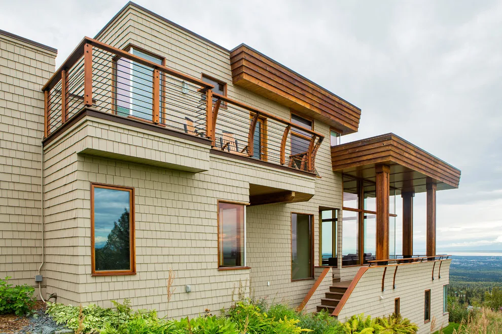 Modern deck featuring custom railings, flooring, gate, and greenhouse by Treeline Construction - Photo 36