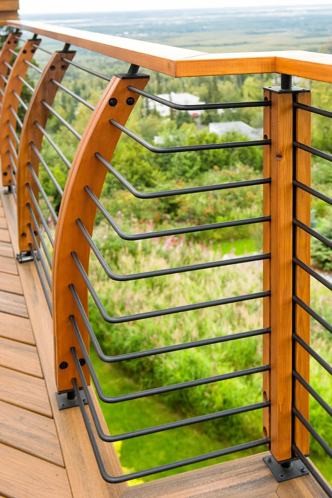 Modern deck featuring custom railings, flooring, gate, and greenhouse by Treeline Construction - Photo 37