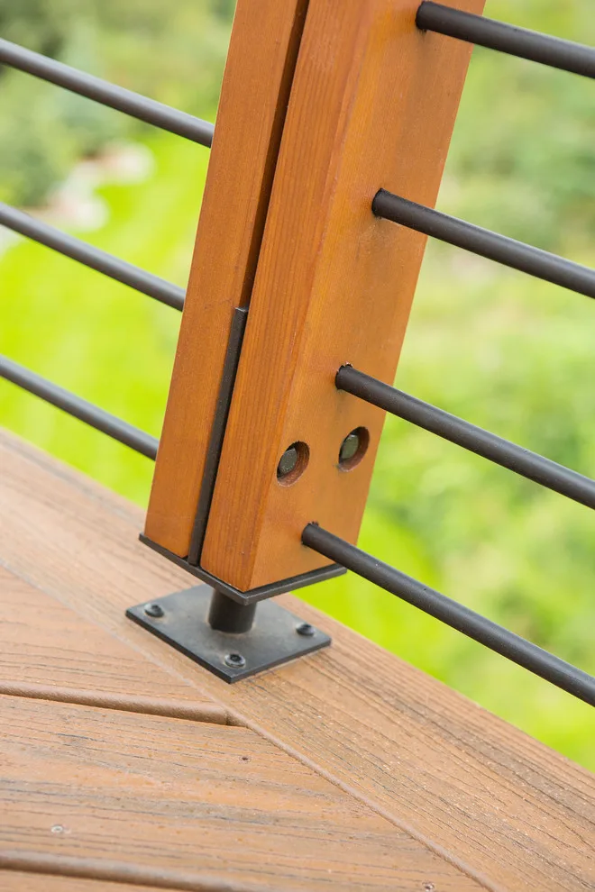 Modern deck featuring custom railings, flooring, gate, and greenhouse by Treeline Construction - Photo 46