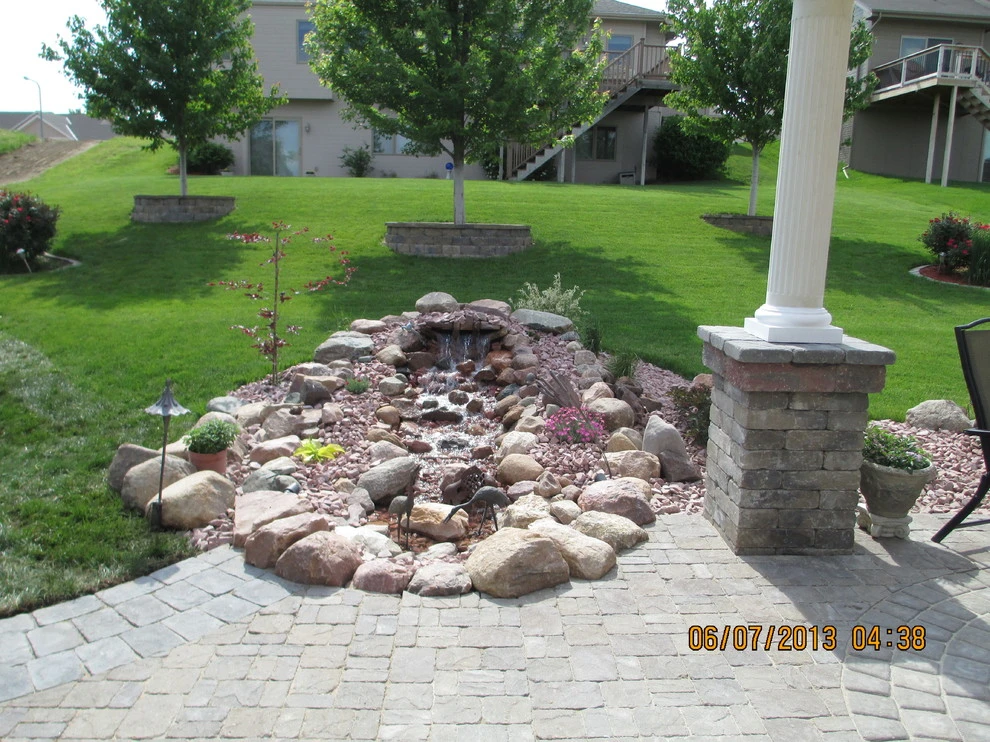 Paver Patio with Fire Place and Pond by Flash-N-Reds Inc - Photo 4