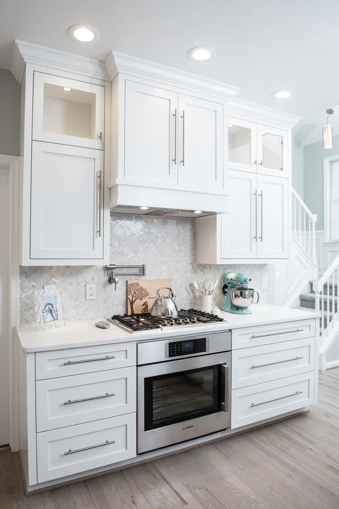 Serene White Kitchen by Labra Design Build - Photo 22