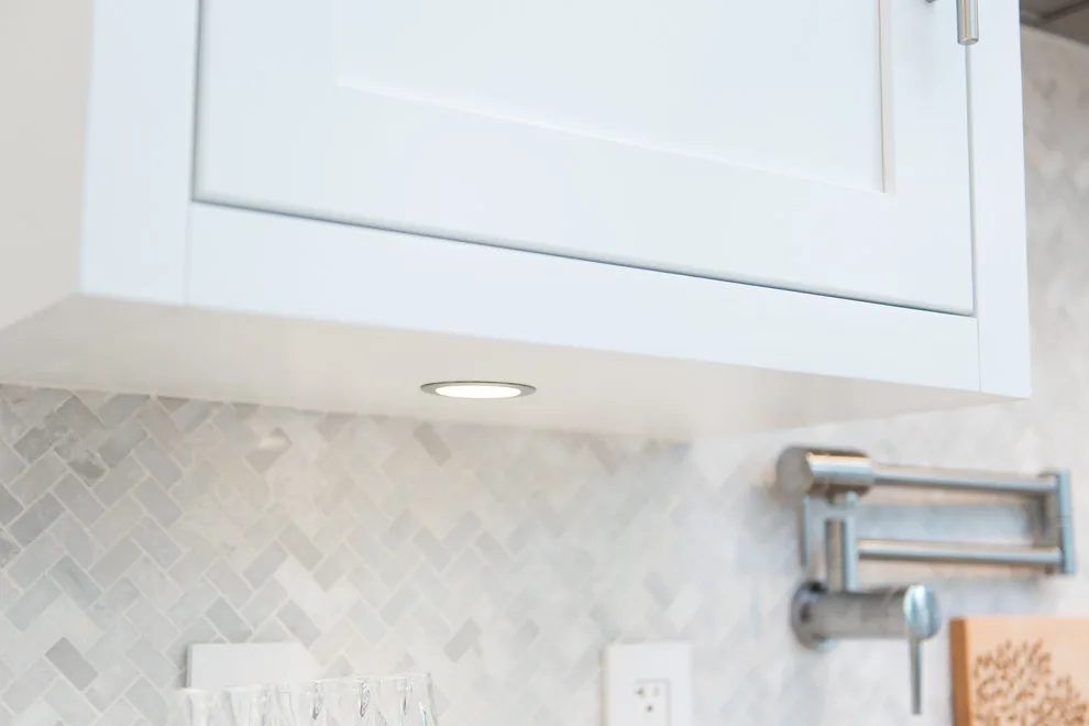 Serene White Kitchen by Labra Design Build - Photo 18