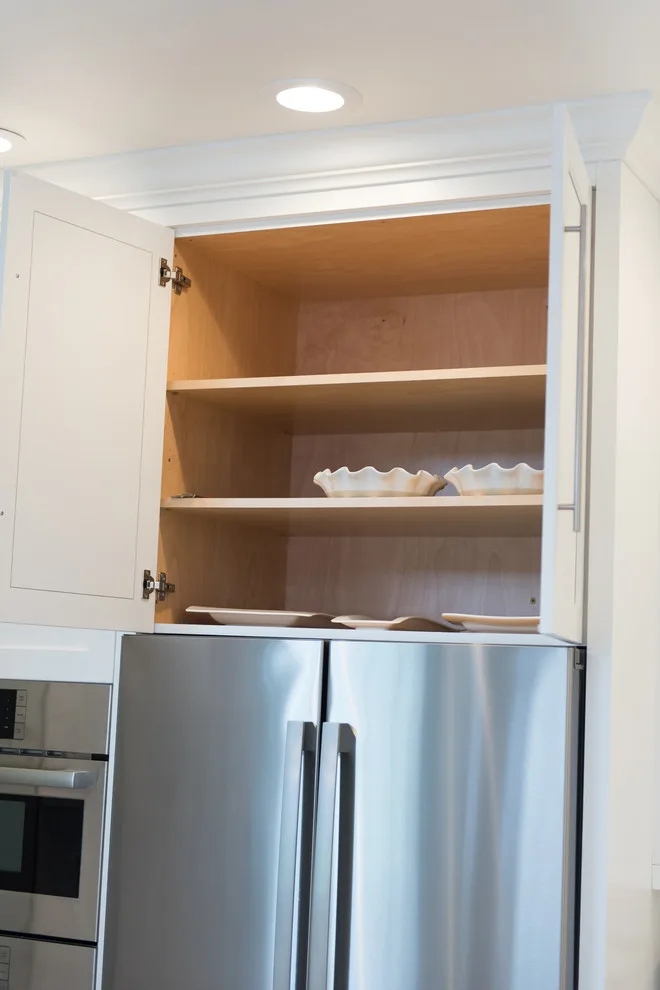 Serene White Kitchen by Labra Design Build - Photo 21