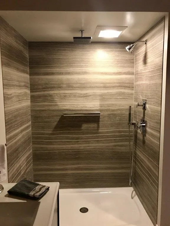 Garrone Bath and Living Area by Johnston Remodeling - Photo 5