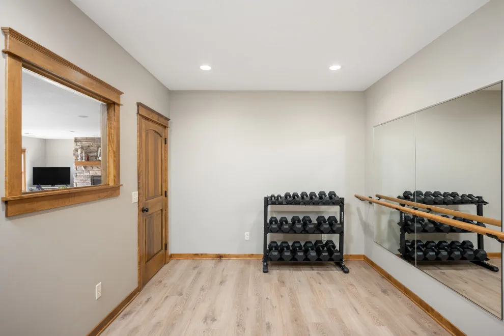 Fitness Center and Relaxation Area by Wise Design & Remodel LLC - Photo 5